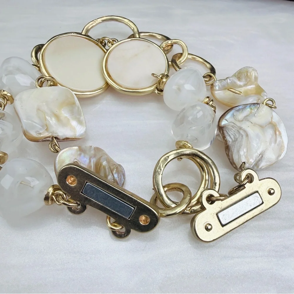 Elegant Goldtone and Cream two strand magnetic closure Bracelet